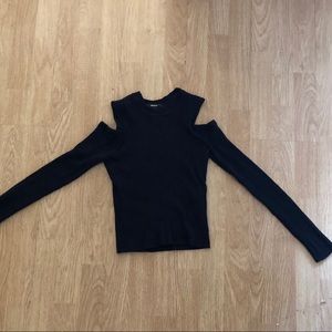 Black long sleeve shirt with peekaboo shoulders.